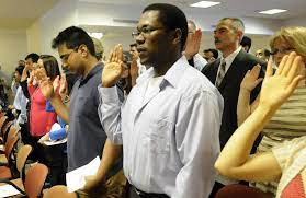 Immigrants taking oath